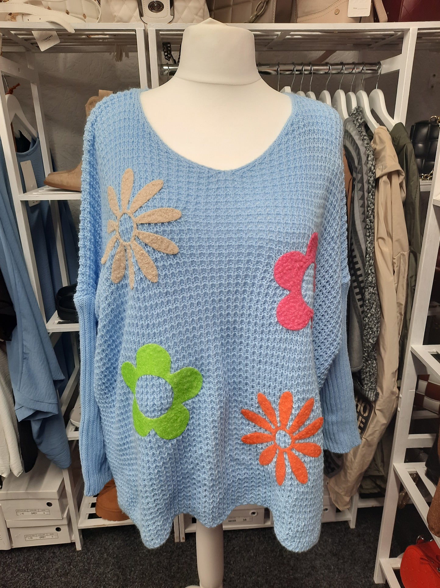 Knitted Jumper with Embossed Flower design...