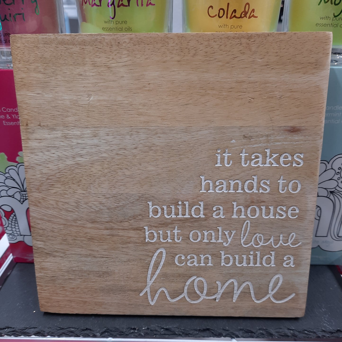 Love Builds a Home Sign